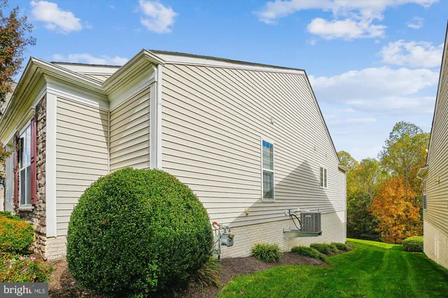 a view of a grassy field with trees