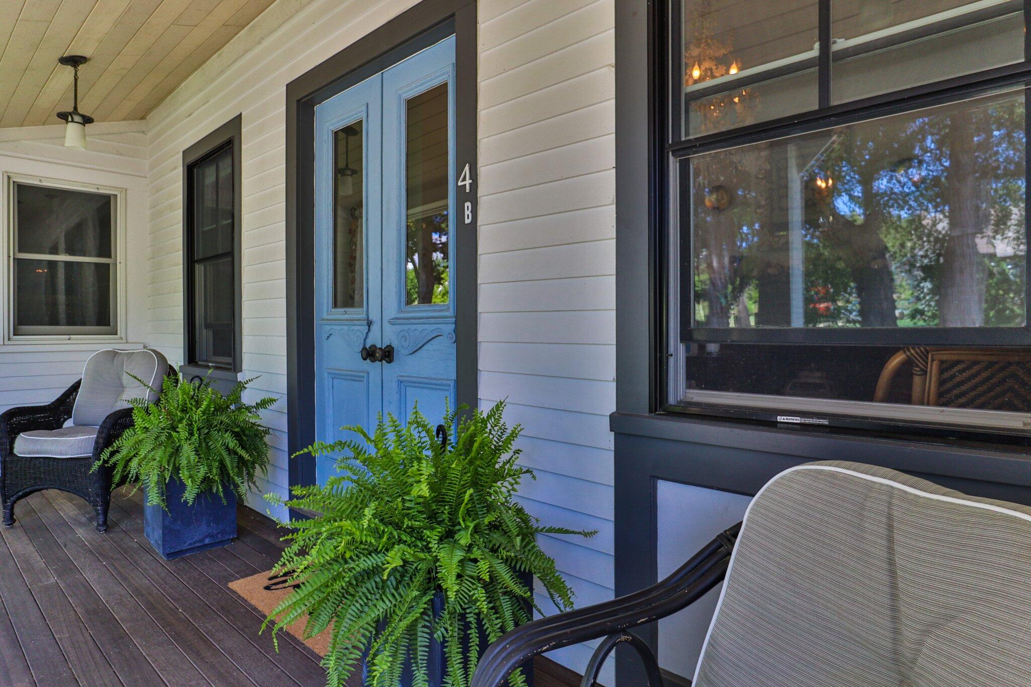 4 Pond Road, Unit B Truro, MA 02666 - Photo 4 of 40 a view of a door with a chair and a potted plant