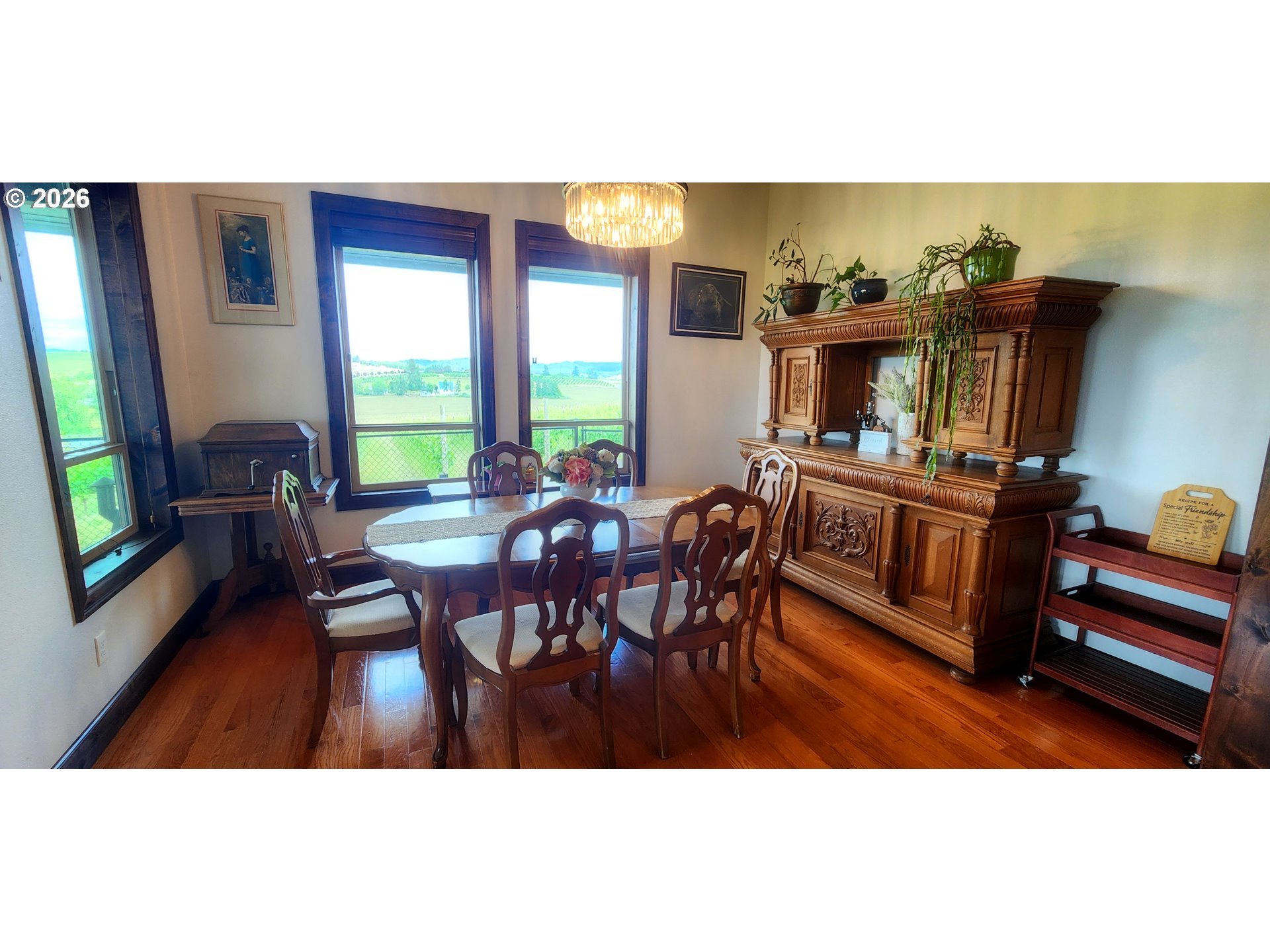 18700 Northwest Adcock Road Yamhill, OR 97148 - Photo 8 of 42 a view of a dining room with furniture window and wooden floor