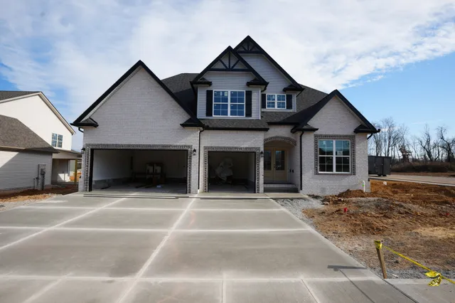 a view of a house with a flat outdoor space