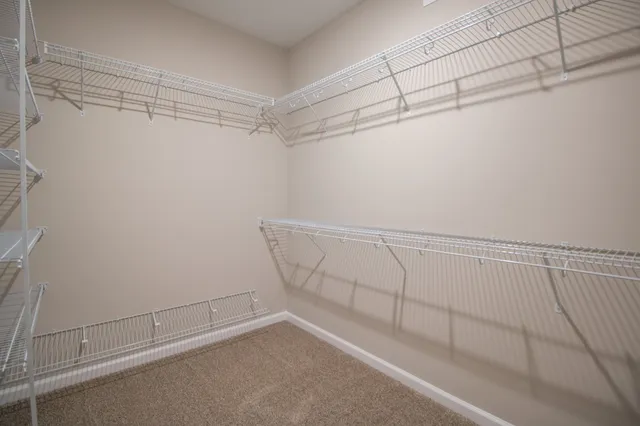a view of a room with racks on the wall