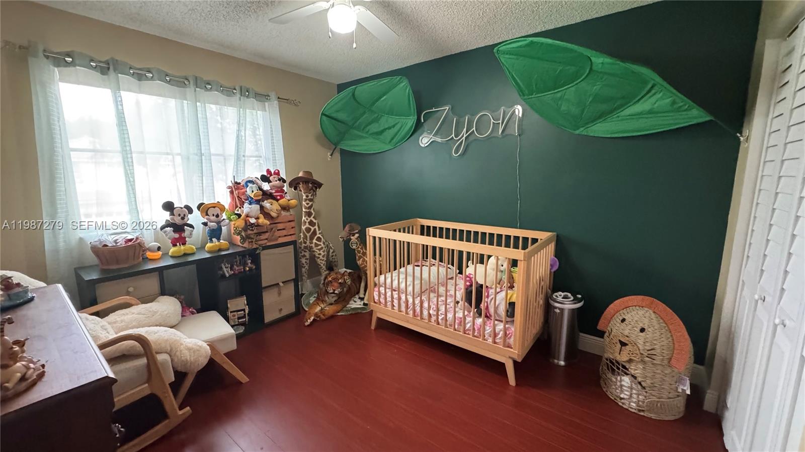 4220 Southwest 153rd Avenue Miramar, FL 33027 - Photo 29 of 34 a view of a room that has a bed and a window