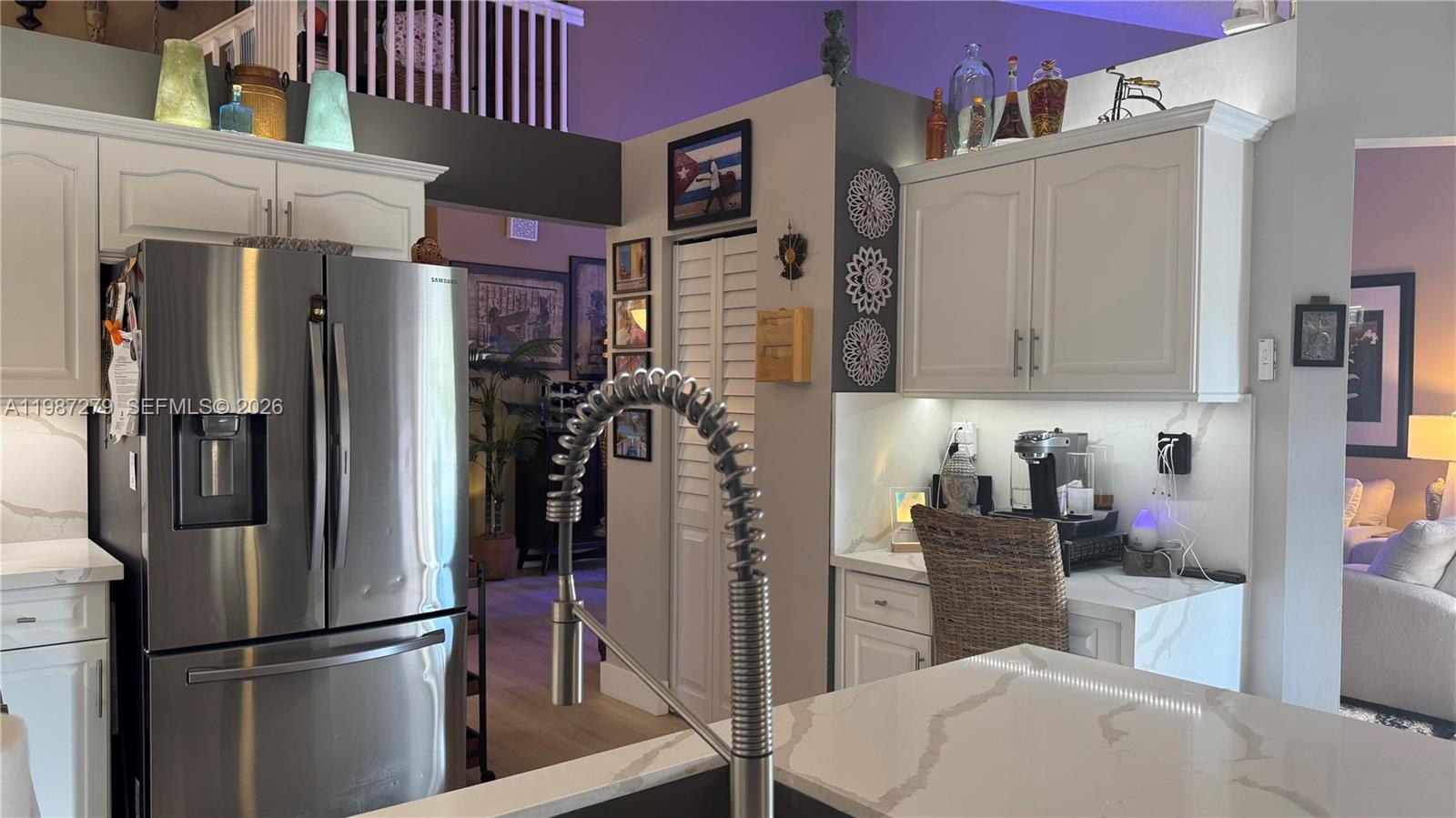 4220 Southwest 153rd Avenue Miramar, FL 33027 - Photo 10 of 34 a kitchen with stainless steel appliances granite countertop a refrigerator and a stove