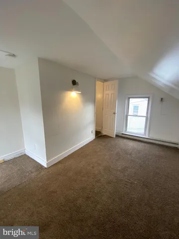 a kitchen with a sink counter top space and a window