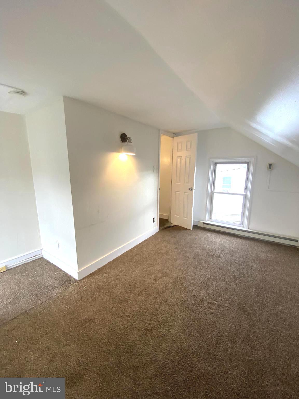 64 South Evans Street Pottstown, PA 19464 - Photo 25 of 31 an empty room with a empty space and windows