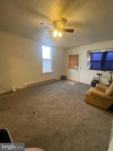 a view of a livingroom with furniture