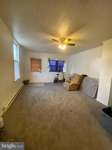 a view of a livingroom with furniture