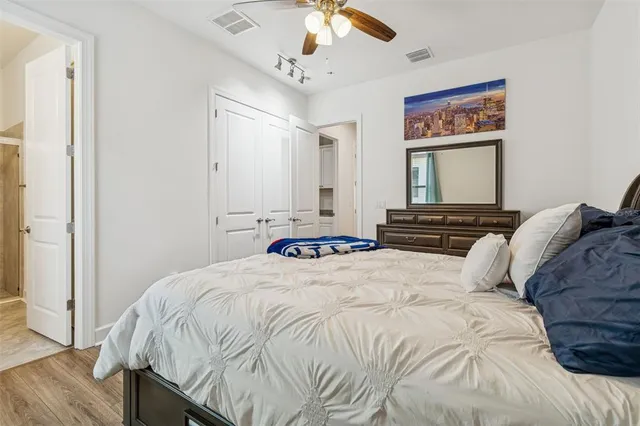 a living room with a bed furniture and a window