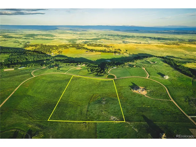 a view of an ocean & house