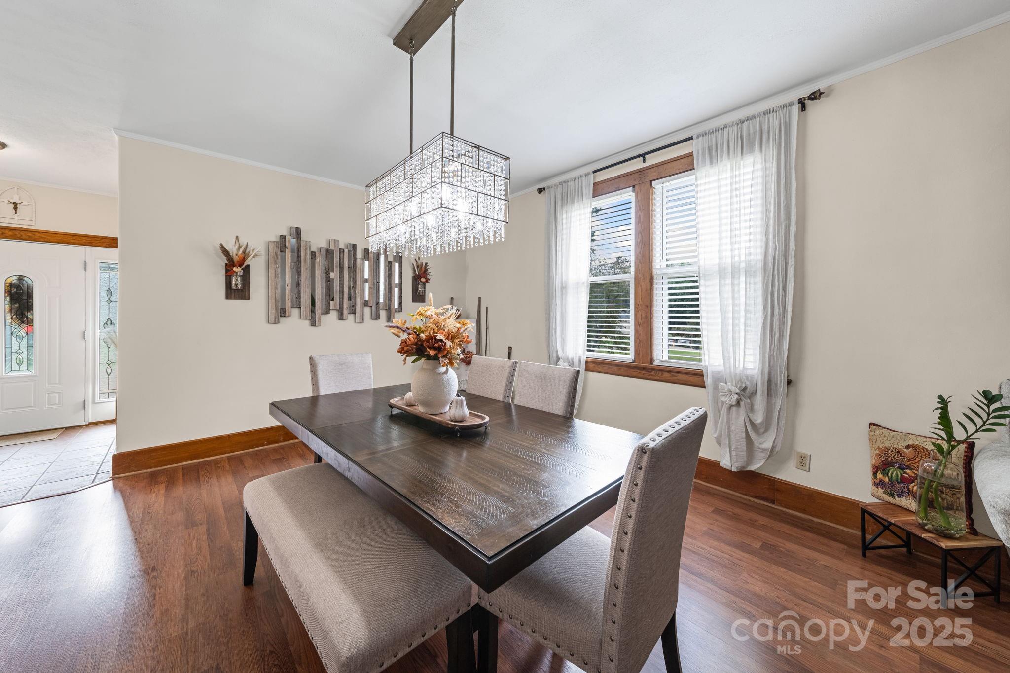 745 Dukeville Road Salisbury, NC 28146 - Photo 11 of 40 a view of a dining room with furniture window and wooden floor