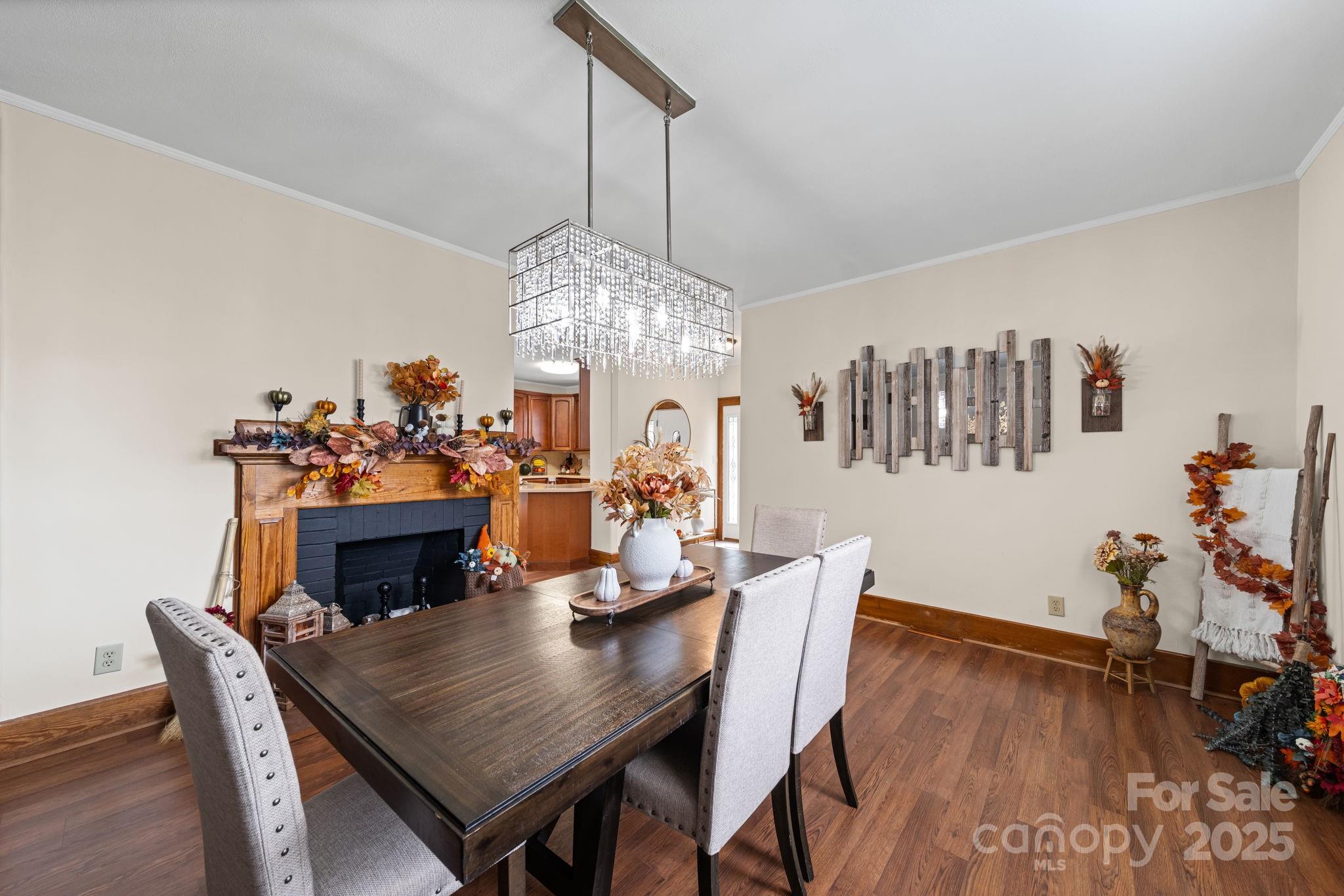 745 Dukeville Road Salisbury, NC 28146 - Photo 12 of 40 a view of a dining room with furniture and wooden floor