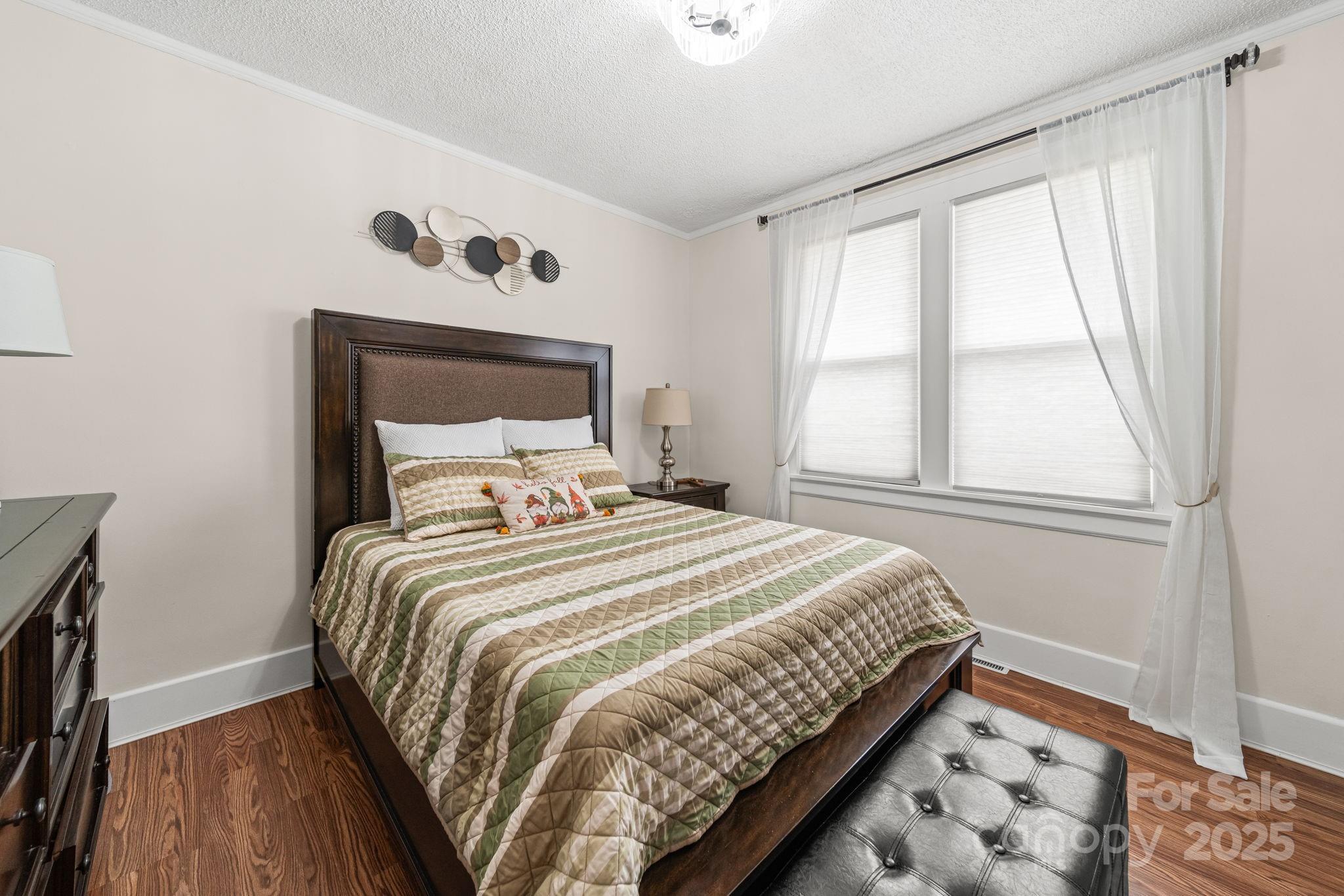745 Dukeville Road Salisbury, NC 28146 - Photo 21 of 40 a bedroom with a bed and a window