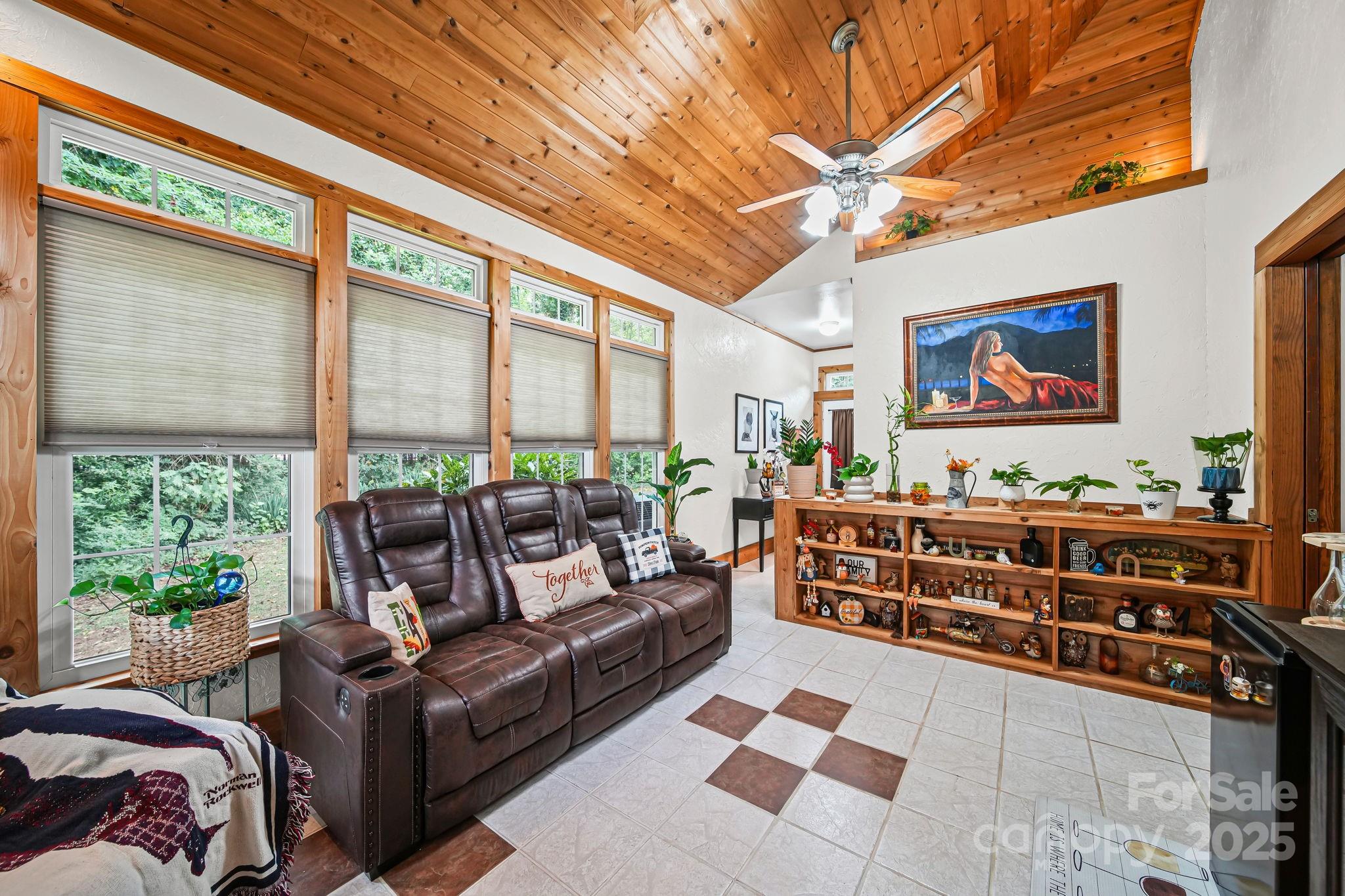 745 Dukeville Road Salisbury, NC 28146 - Photo 28 of 40 a living room with furniture and a large window