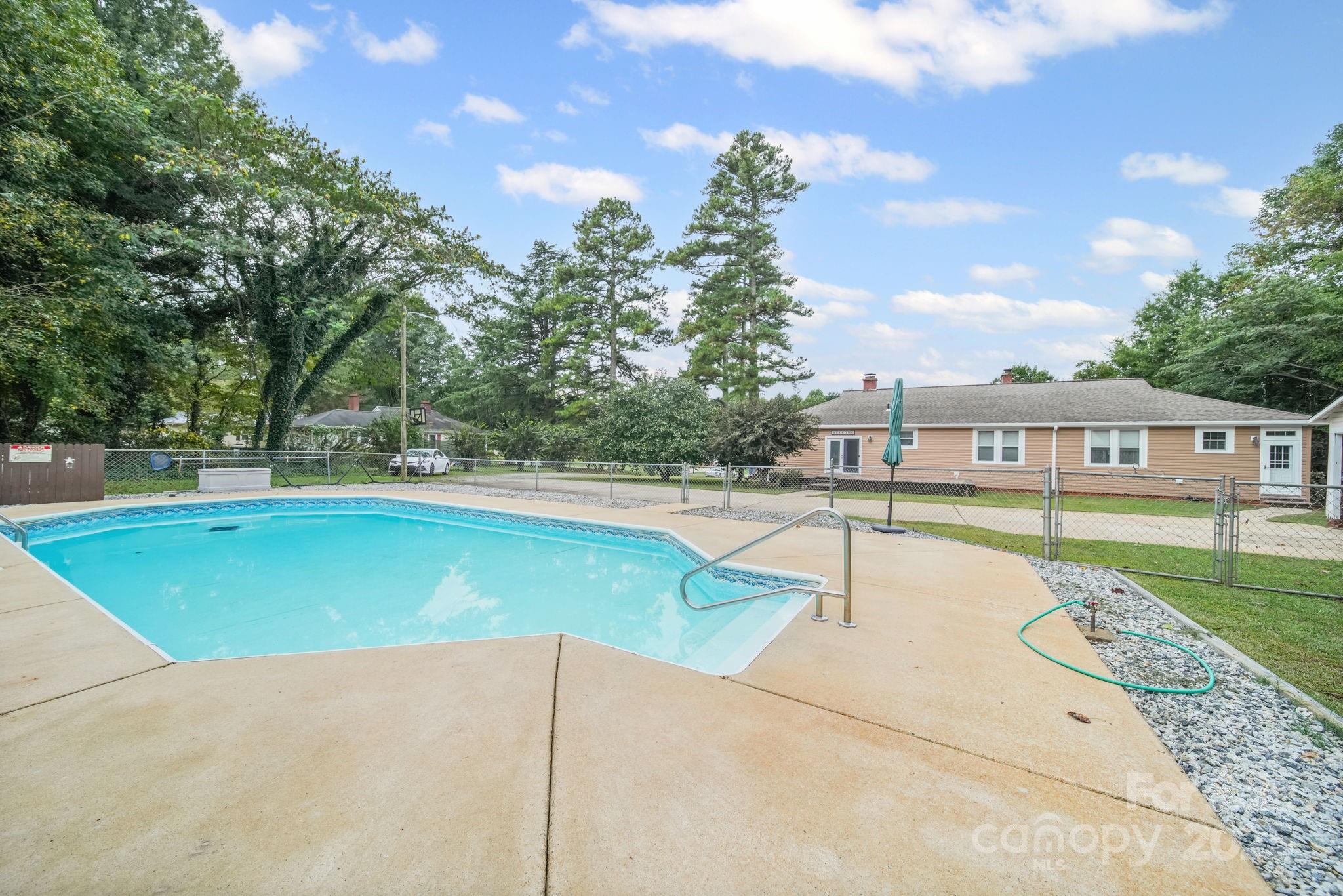 745 Dukeville Road Salisbury, NC 28146 - Photo 35 of 40 a view of a swimming pool with a yard