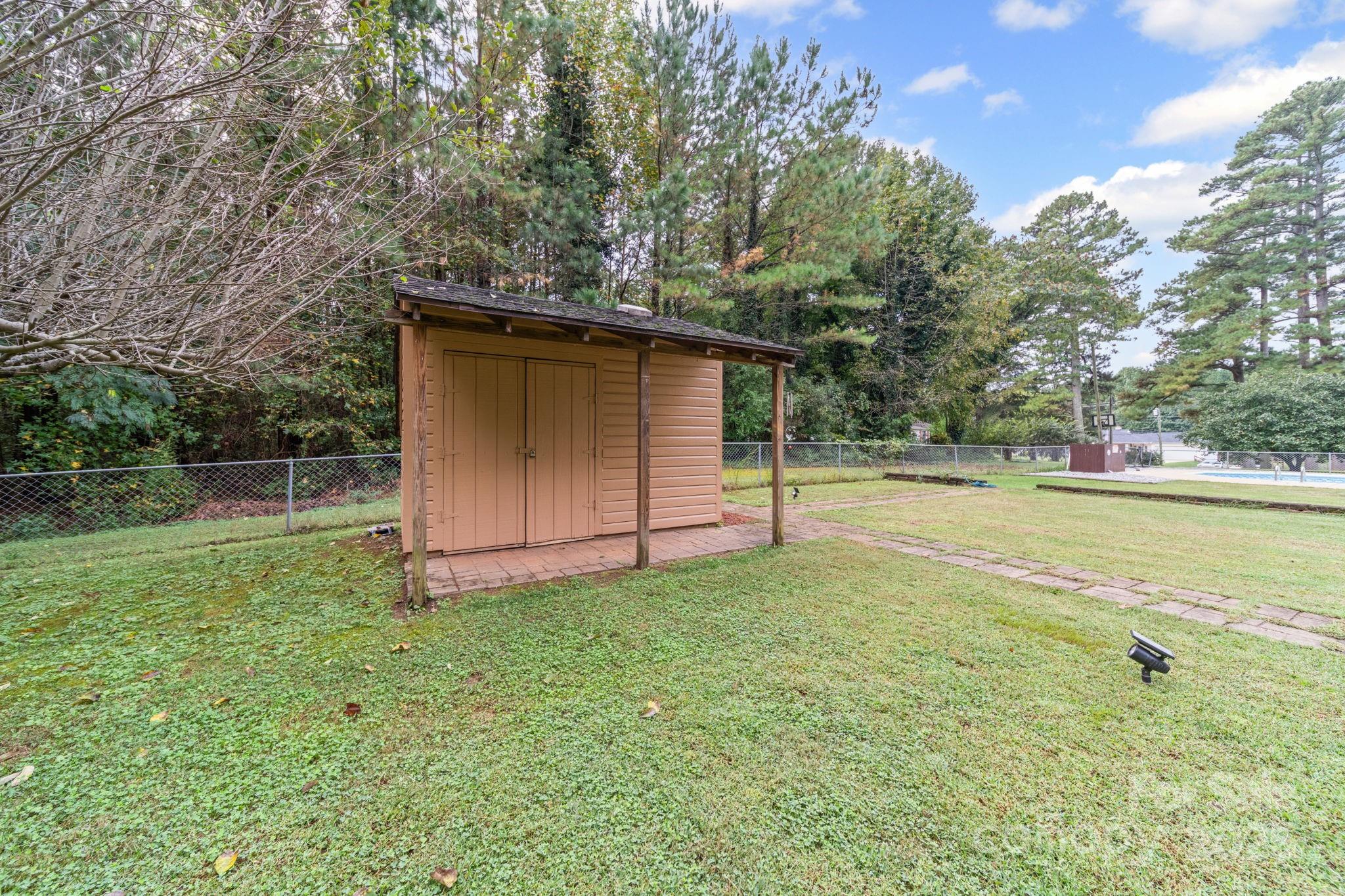 745 Dukeville Road Salisbury, NC 28146 - Photo 6 of 40 a view of a backyard with large trees