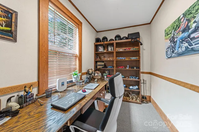 a view of a workspace with furniture and toys