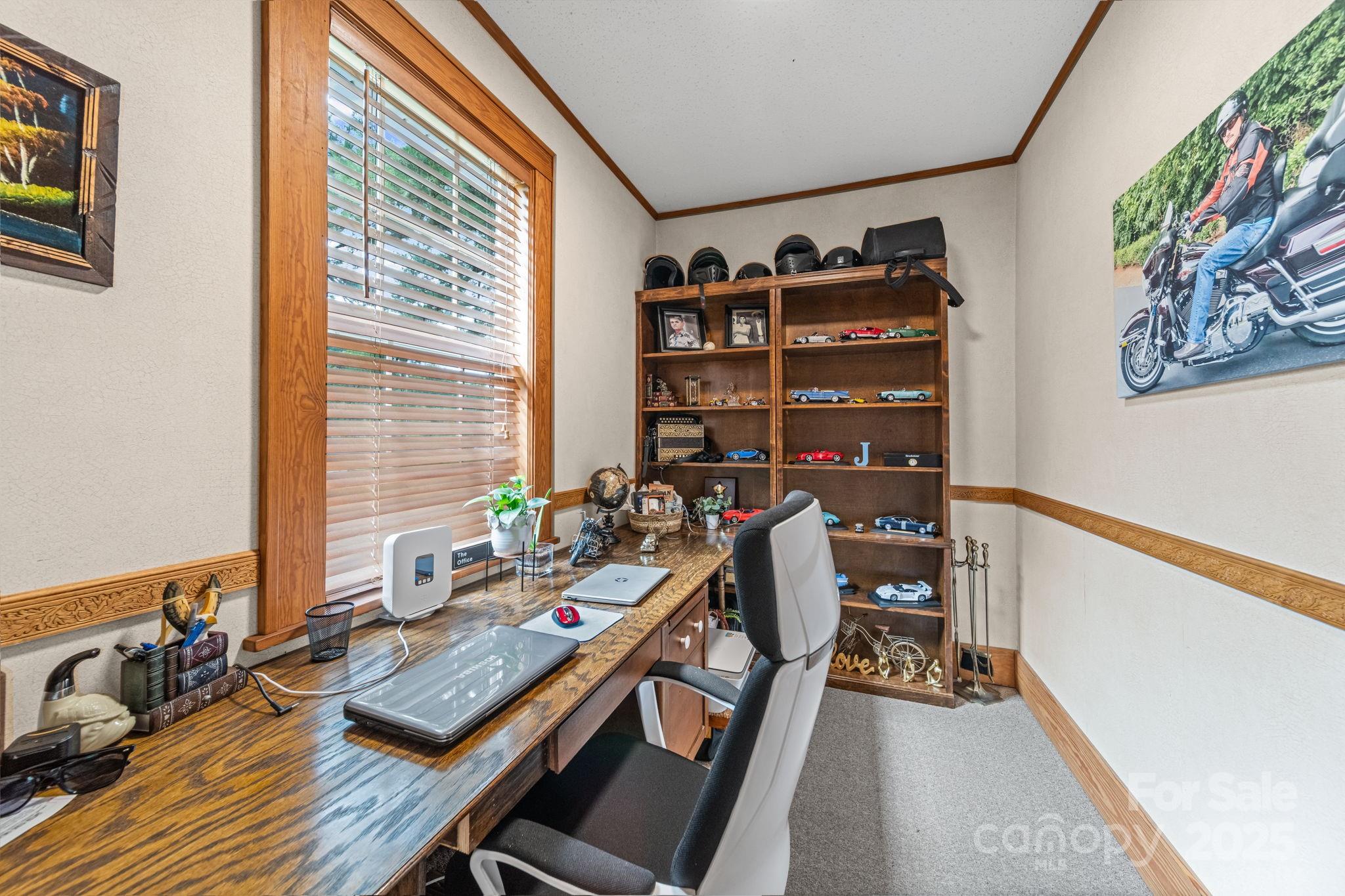 745 Dukeville Road Salisbury, NC 28146 - Photo 9 of 40 a view of a workspace with furniture and toys