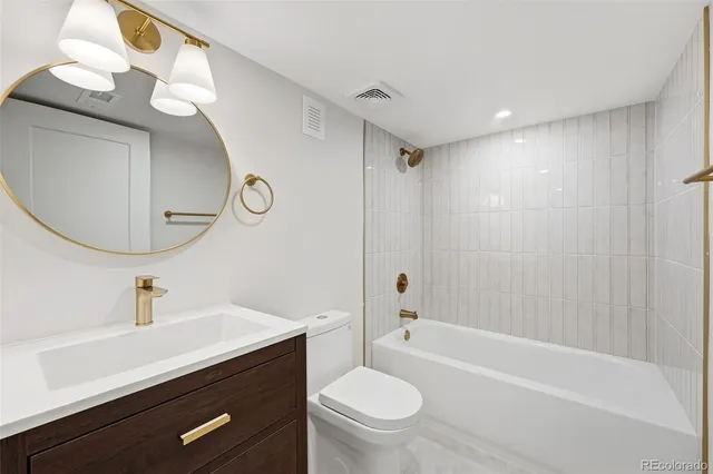 a view of a balcony with a tree