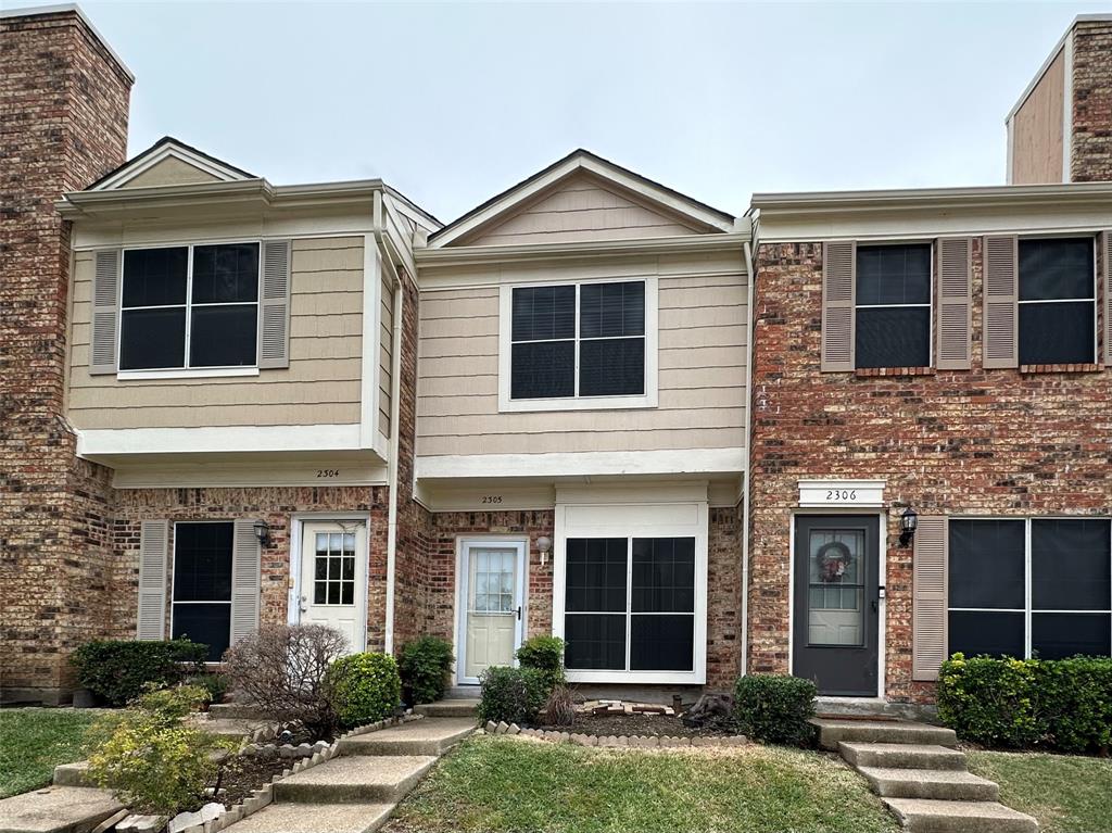 3801 14th Street, Unit 2305 Plano, TX 75074 - Photo 1 of 16 a front view of a house with garden