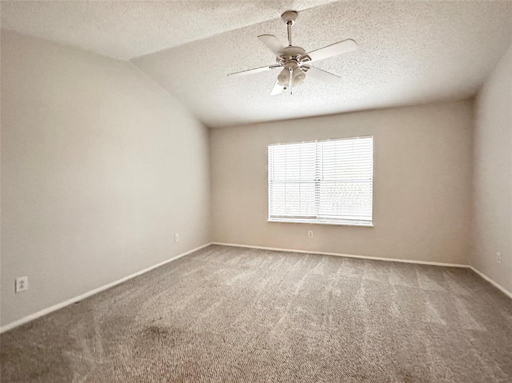 3801 14th Street, Unit 2305 Plano, TX 75074 - Photo 11 of 16 wooden floor in an empty room with a window