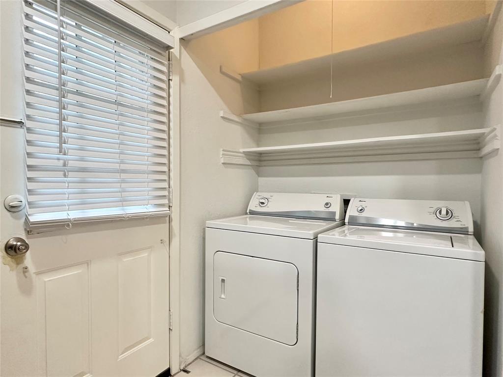 3801 14th Street, Unit 2305 Plano, TX 75074 - Photo 15 of 16 a utility room with dryer and washer