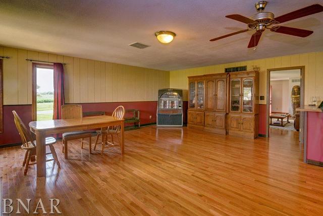9537 Tabor Road Clinton, IL 61727 - Photo 2 of 17 a living room with furniture and wooden floor