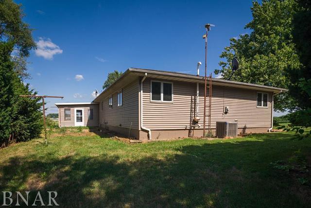 9537 Tabor Road Clinton, IL 61727 - Photo 15 of 17 a front view of house with yard and green space