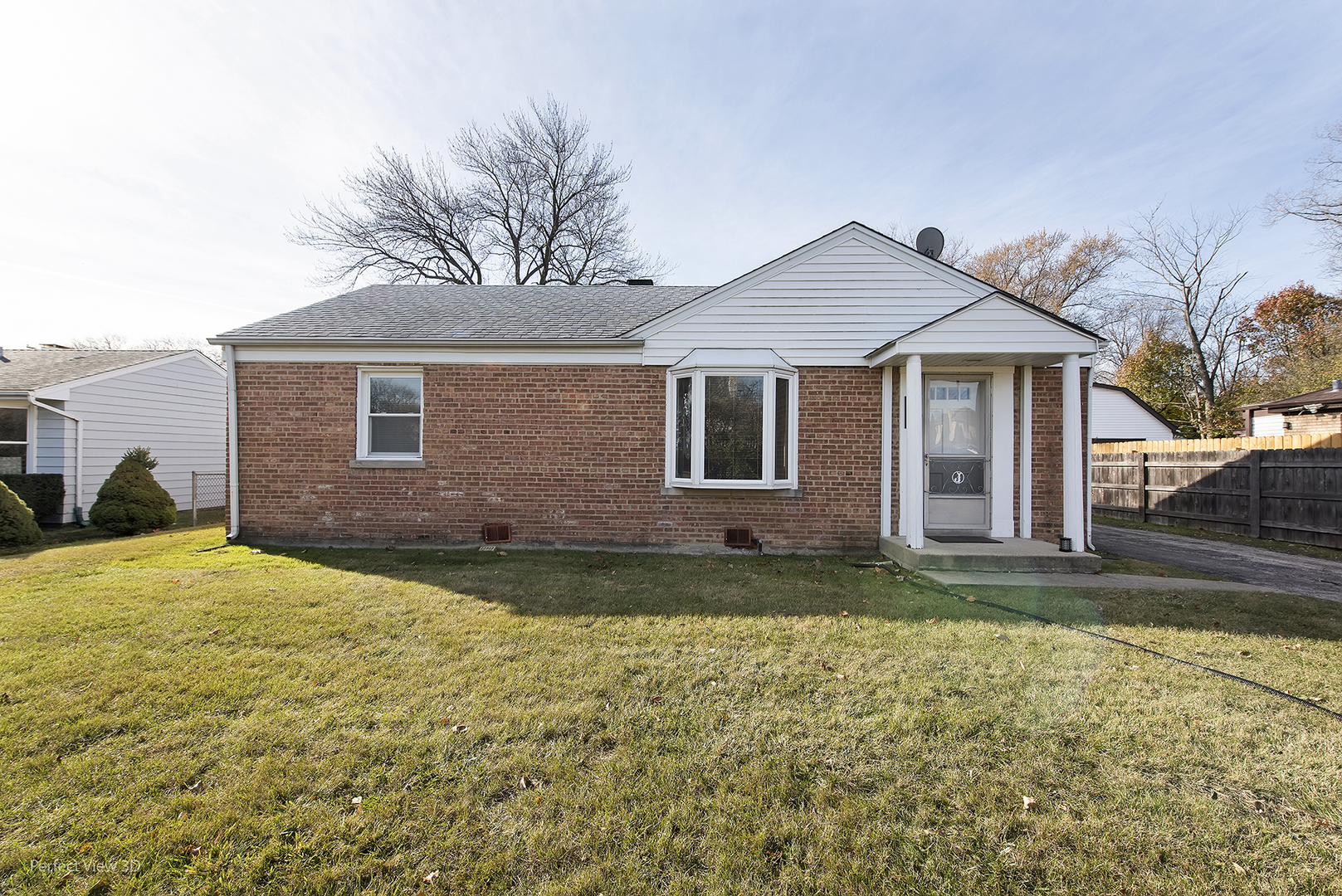 603 West Rand Road Mount Prospect, IL 60056 - Photo 2 of 20 a front view of a house with a yard
