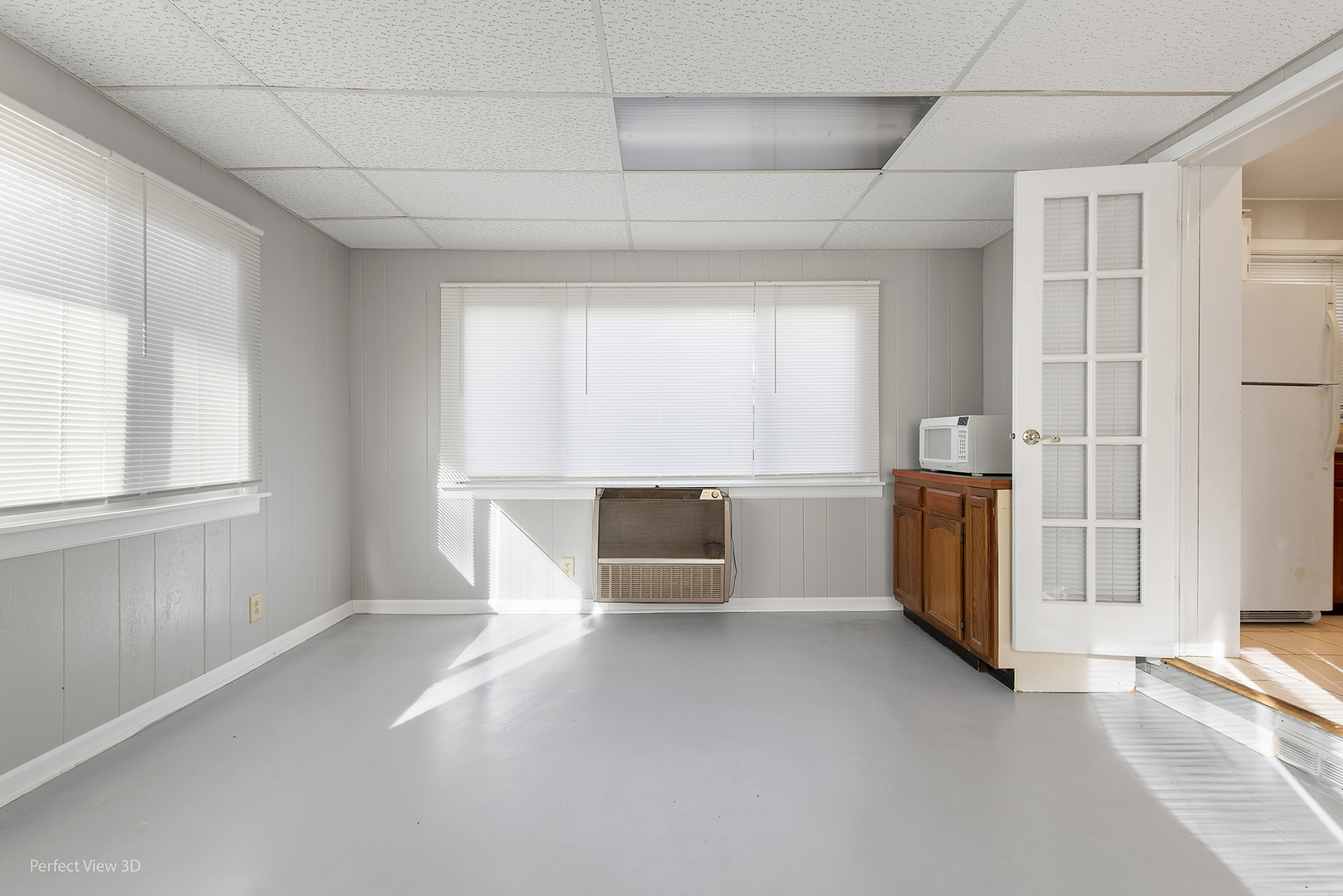 603 West Rand Road Mount Prospect, IL 60056 - Photo 13 of 20 an empty room with windows