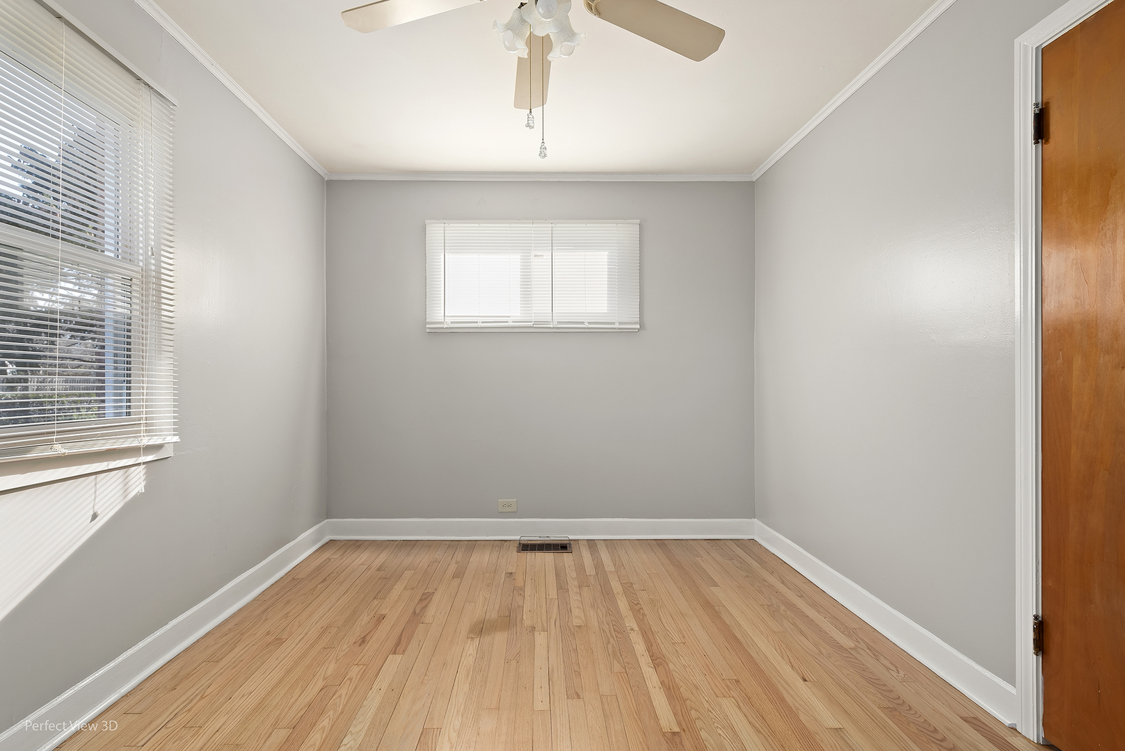 603 West Rand Road Mount Prospect, IL 60056 - Photo 15 of 20 wooden floor in an empty room with a window