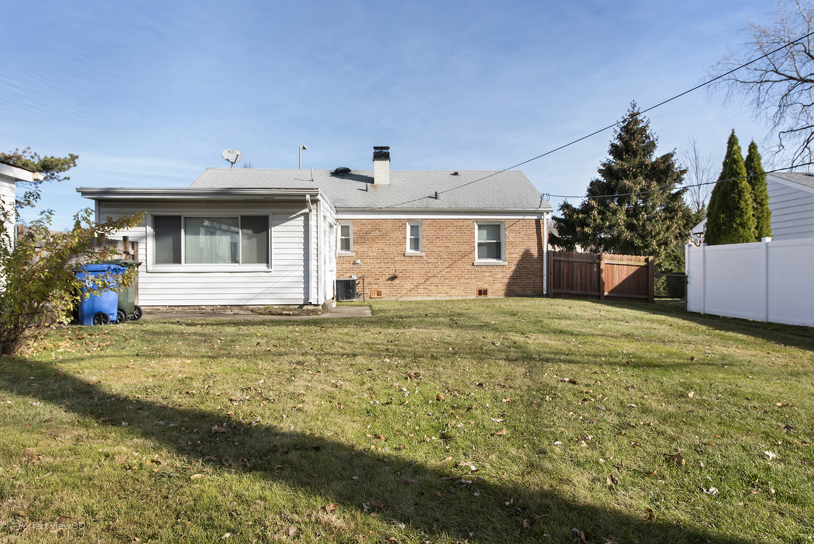 603 West Rand Road Mount Prospect, IL 60056 - Photo 18 of 20 a view of a house with a backyard