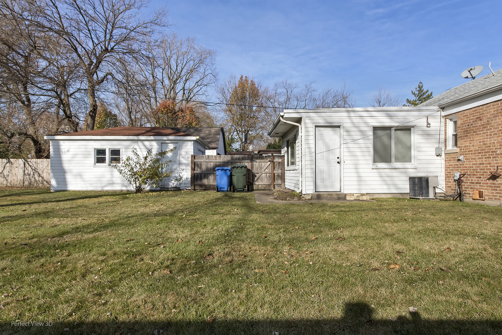 603 West Rand Road Mount Prospect, IL 60056 - Photo 19 of 20 a front view of a house with garden