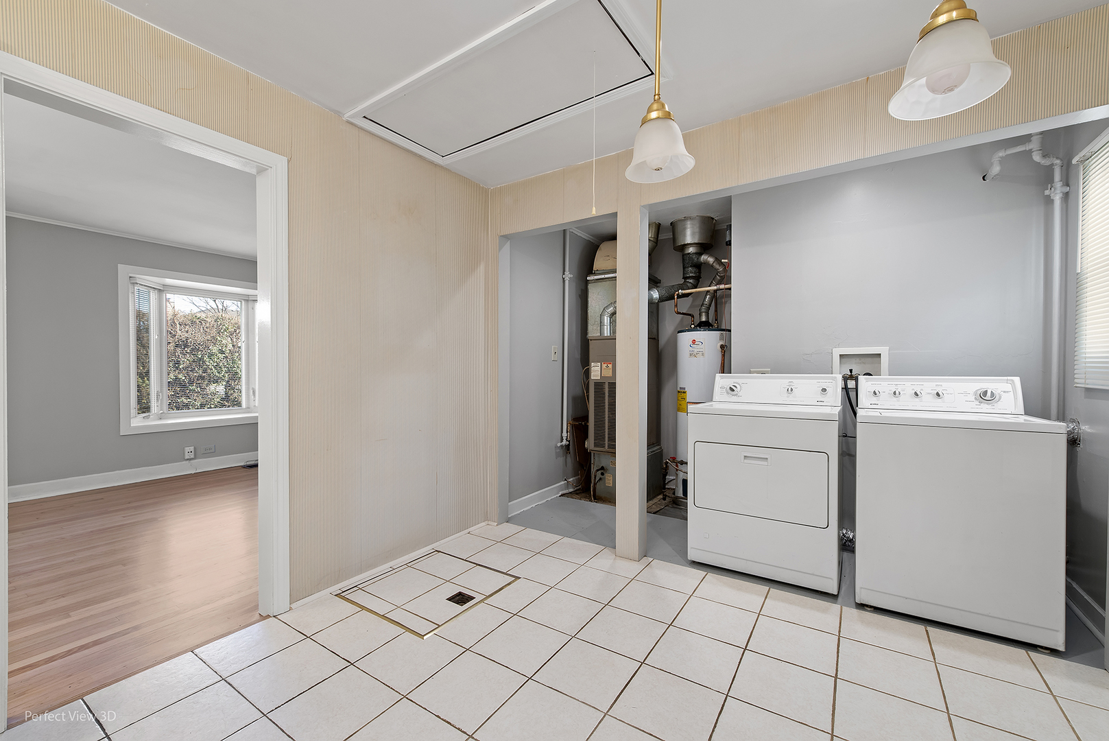 603 West Rand Road Mount Prospect, IL 60056 - Photo 9 of 20 a view of storage and utility room with washer and dryer