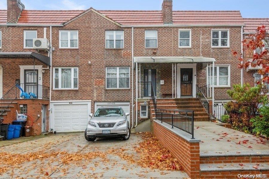 a car parked in front of a house