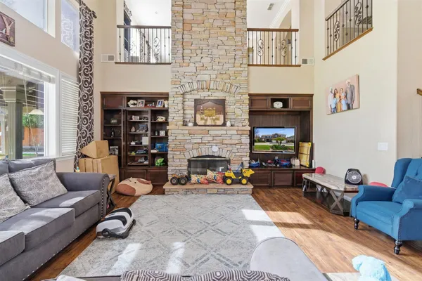 a kitchen with granite countertop wooden cabinets and stainless steel appliances