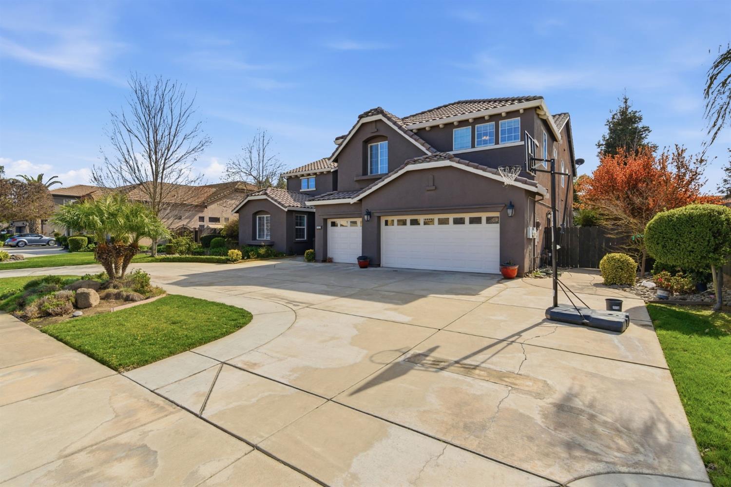 848 West Santos Avenue Ripon, CA 95366 - Photo 3 of 63 a front view of a house with a yard