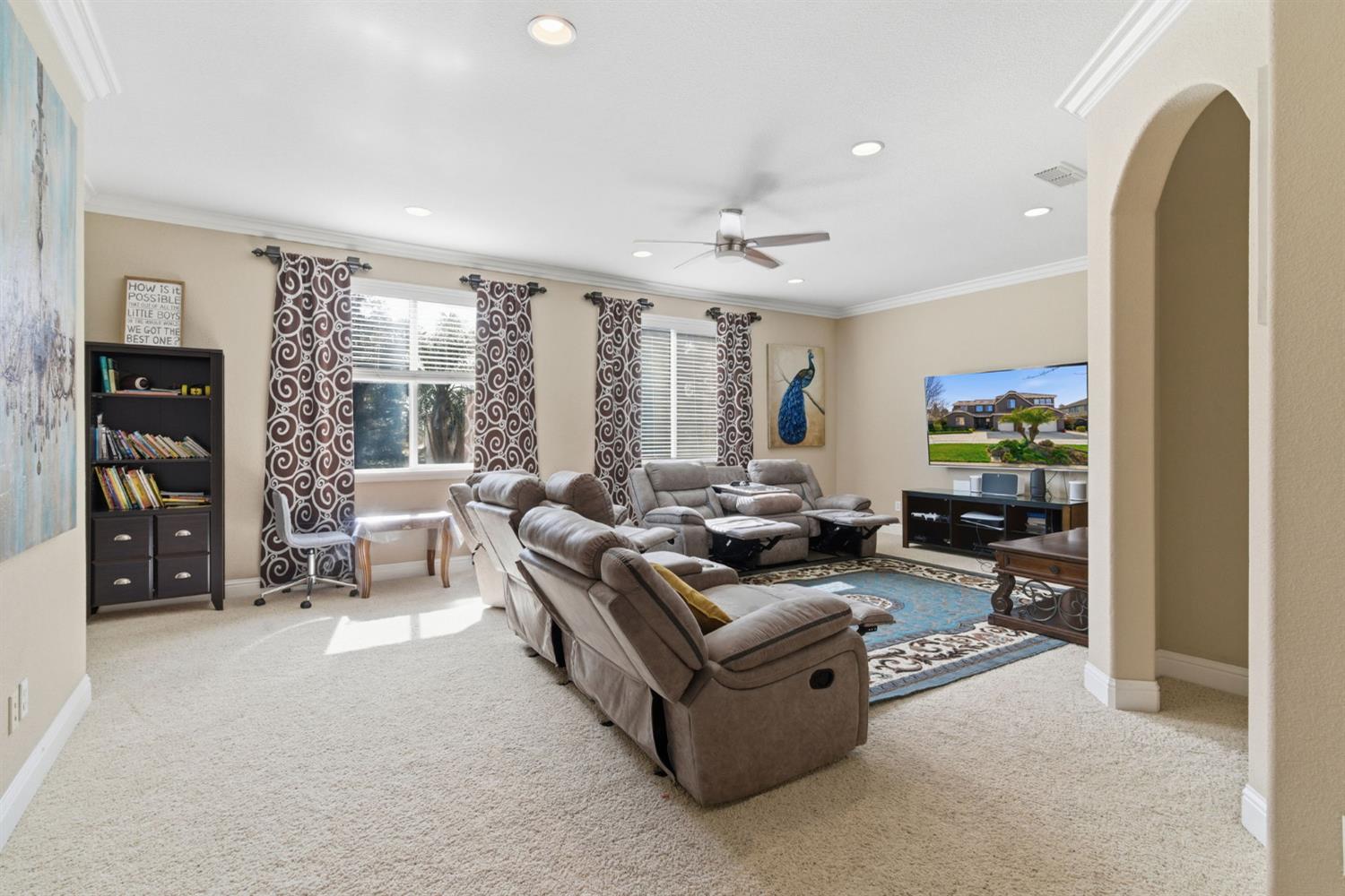 848 West Santos Avenue Ripon, CA 95366 - Photo 35 of 63 a living room with furniture and a large window