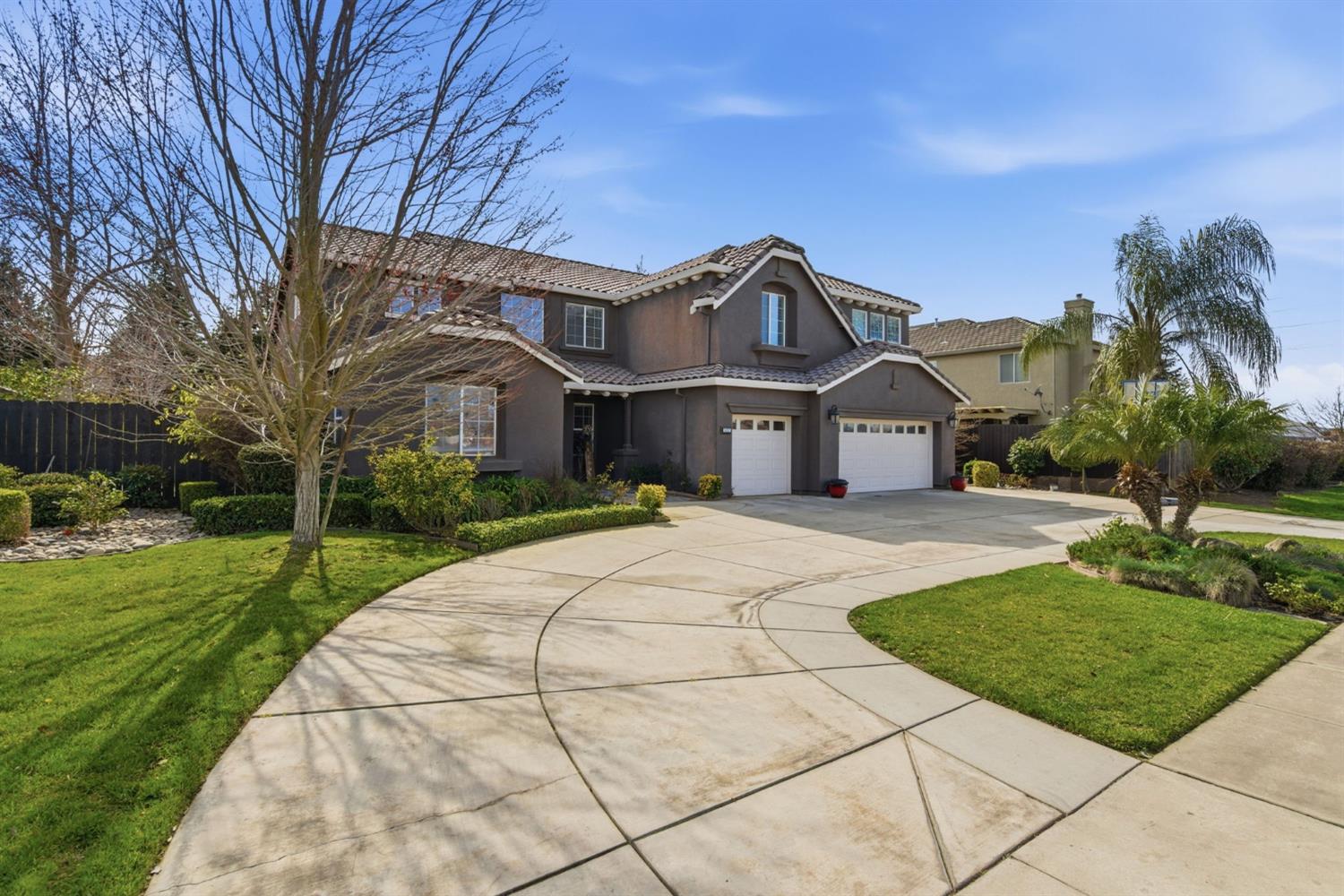 848 West Santos Avenue Ripon, CA 95366 - Photo 4 of 63 a front view of a house with yard