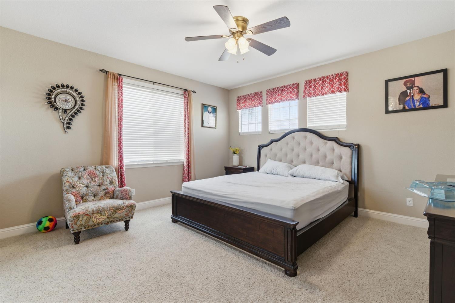 848 West Santos Avenue Ripon, CA 95366 - Photo 42 of 63 a bedroom with a bed and a window