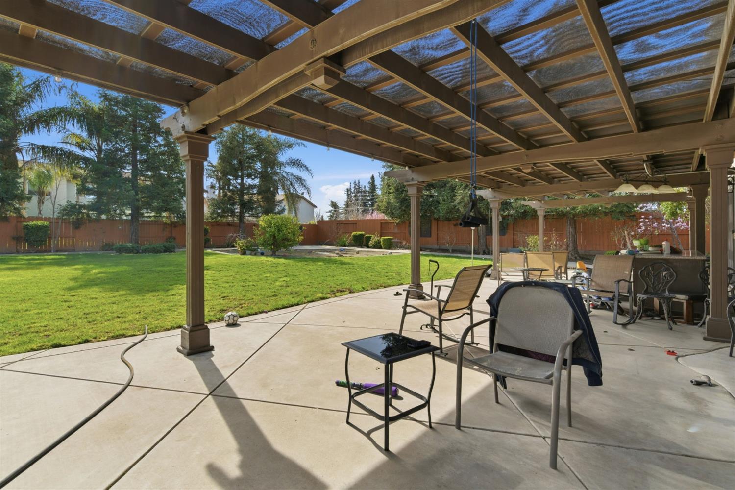 848 West Santos Avenue Ripon, CA 95366 - Photo 45 of 63 a view of a patio with a backyard