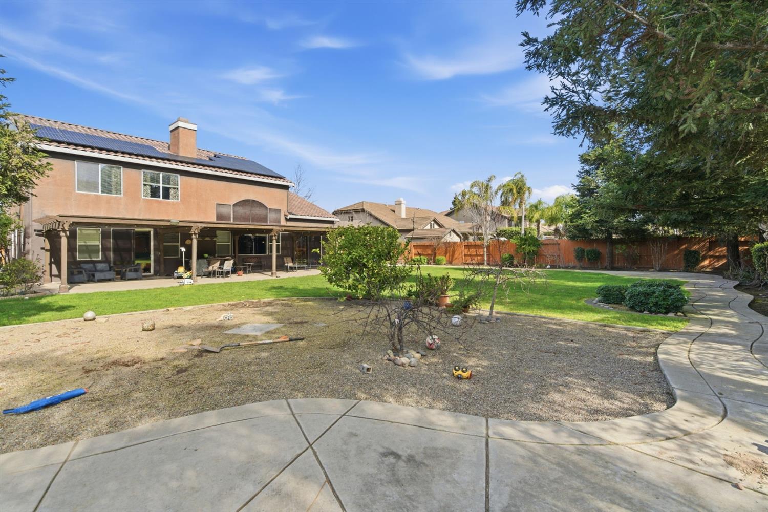 848 West Santos Avenue Ripon, CA 95366 - Photo 48 of 63 a front view of house with yard
