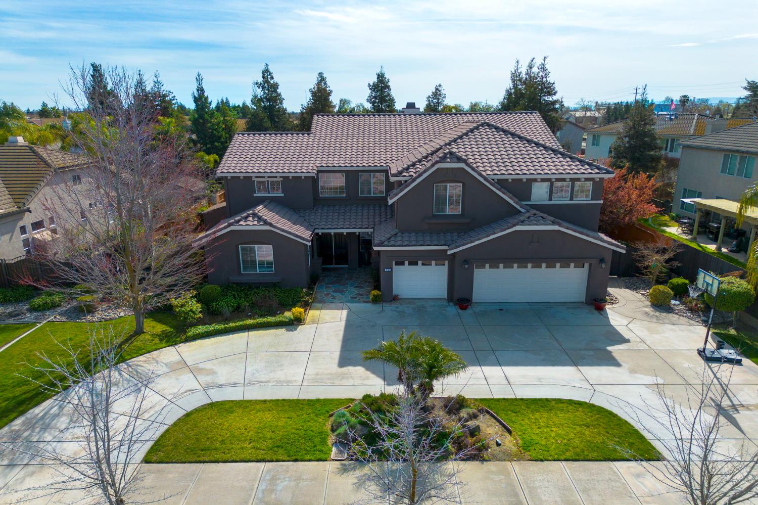 848 West Santos Avenue Ripon, CA 95366 - Photo 51 of 63 a front view of a house with a yard