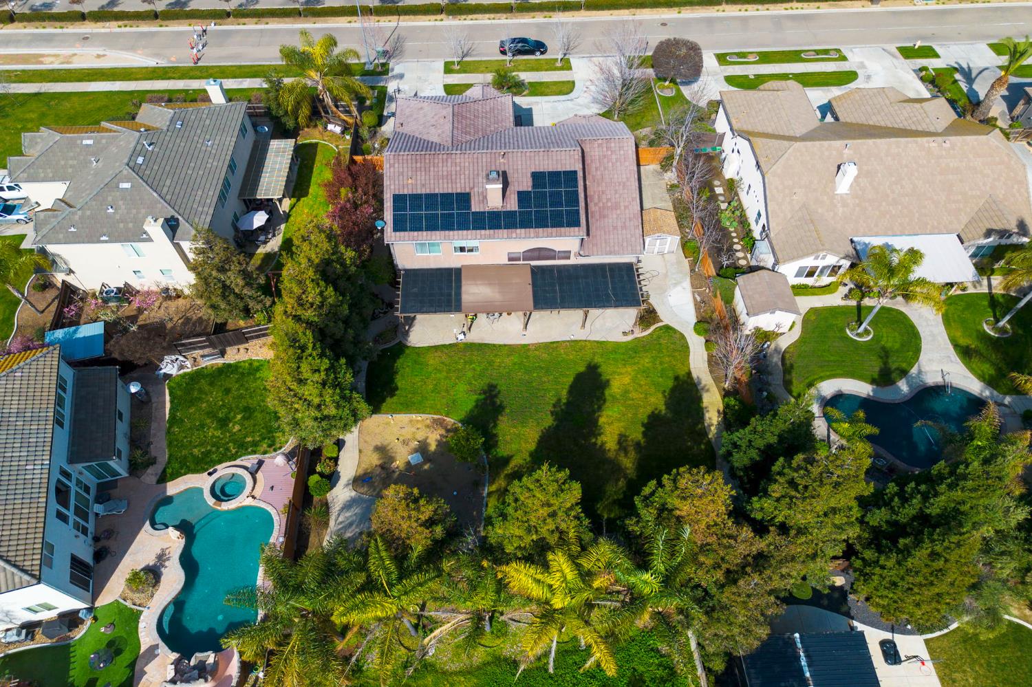 848 West Santos Avenue Ripon, CA 95366 - Photo 54 of 63 a aerial view of a house with a yard swimming pool