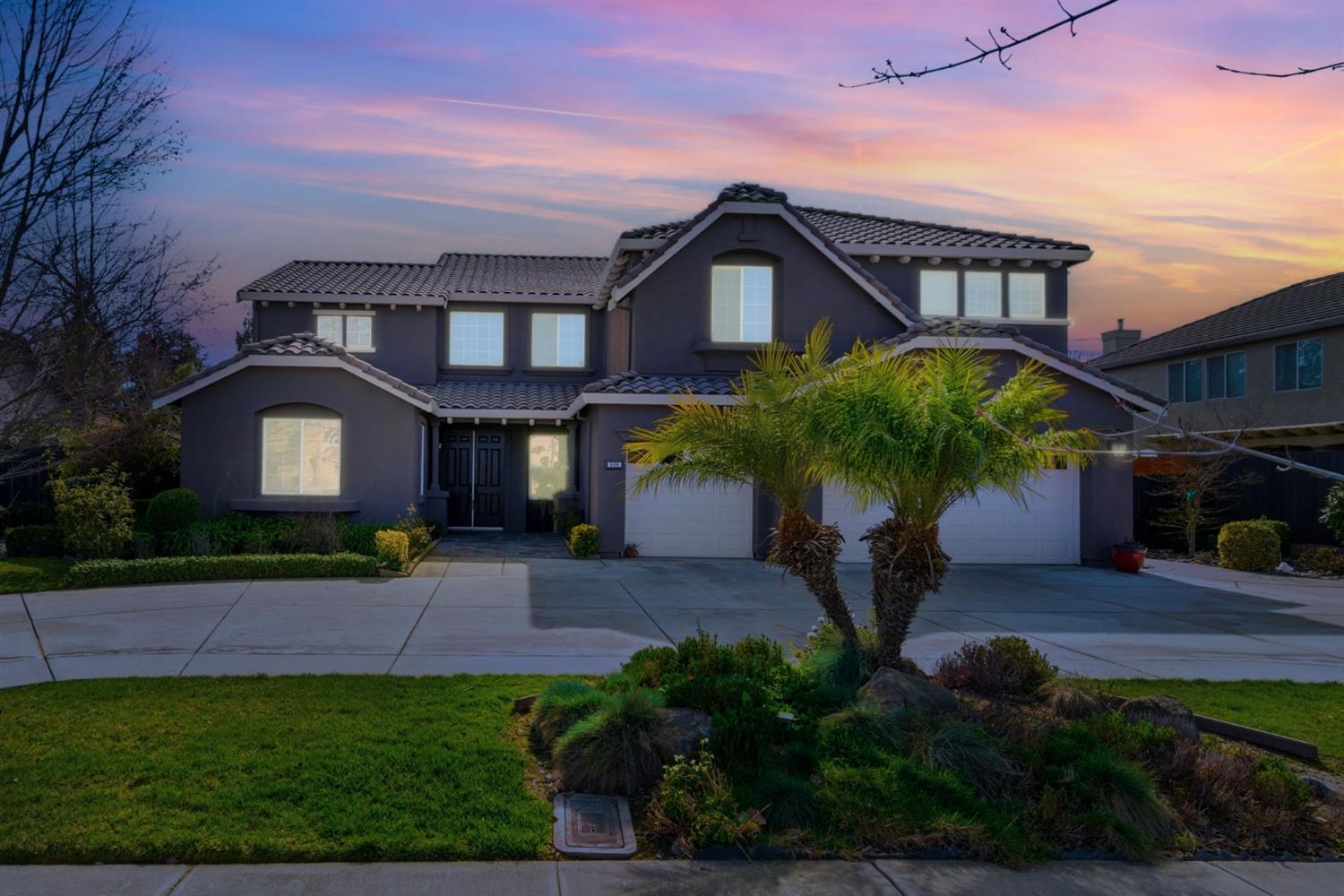 848 West Santos Avenue Ripon, CA 95366 - Photo 63 of 63 a front view of a house with garden