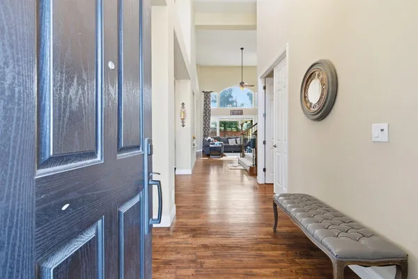a view of a dining room with furniture window and wooden floor