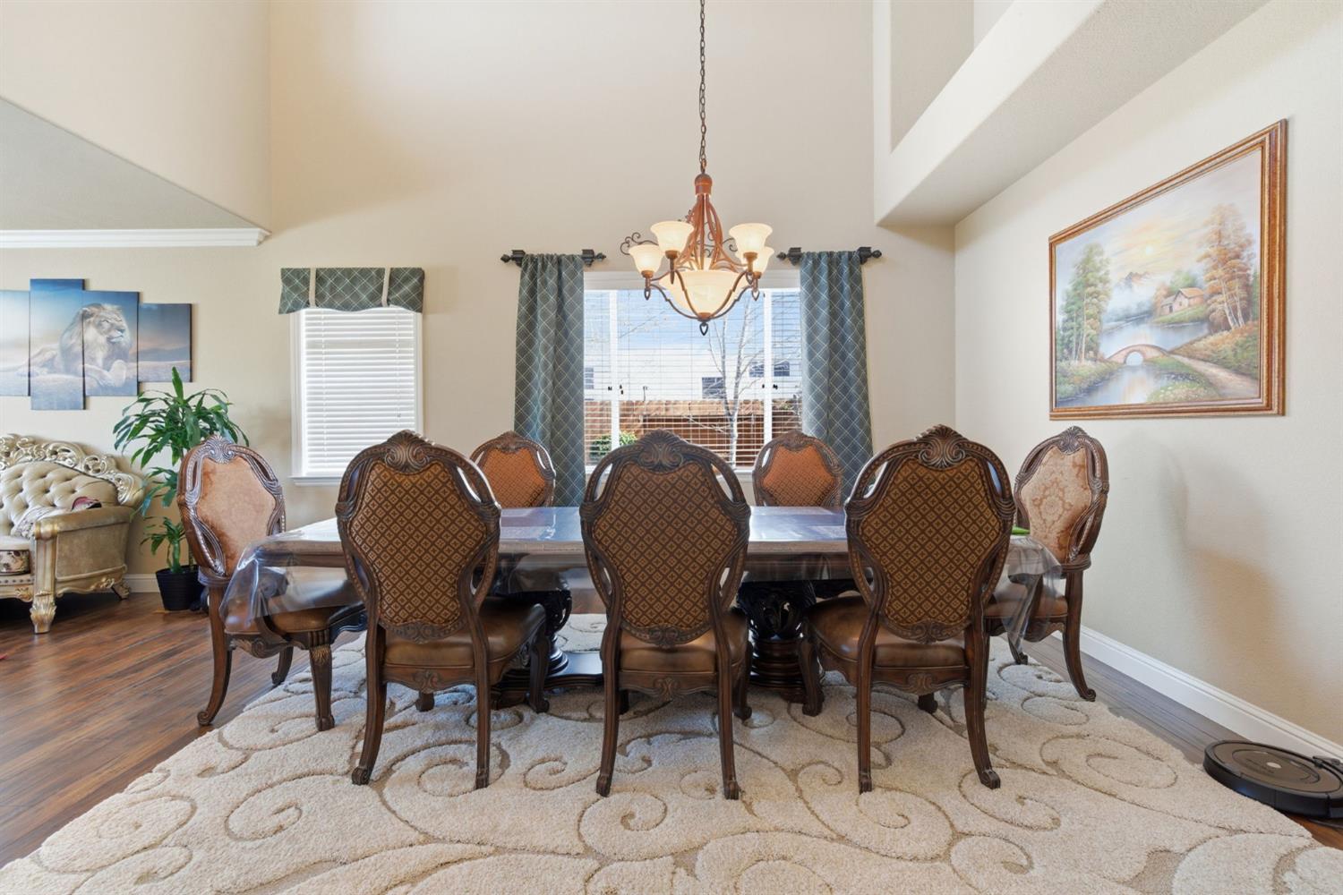 848 West Santos Avenue Ripon, CA 95366 - Photo 10 of 63 a view of a dining room with furniture window and wooden floor