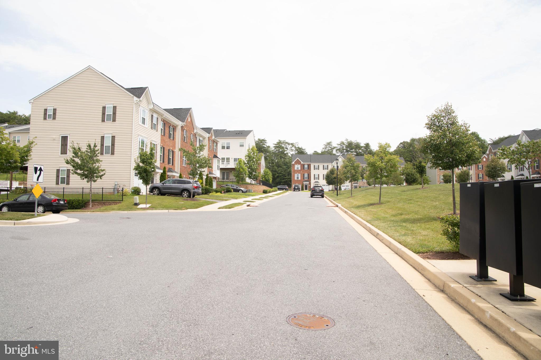 1813 Wind Gate Road Baltimore, MD 21227 - Photo 2 of 27 a view of a street with houses