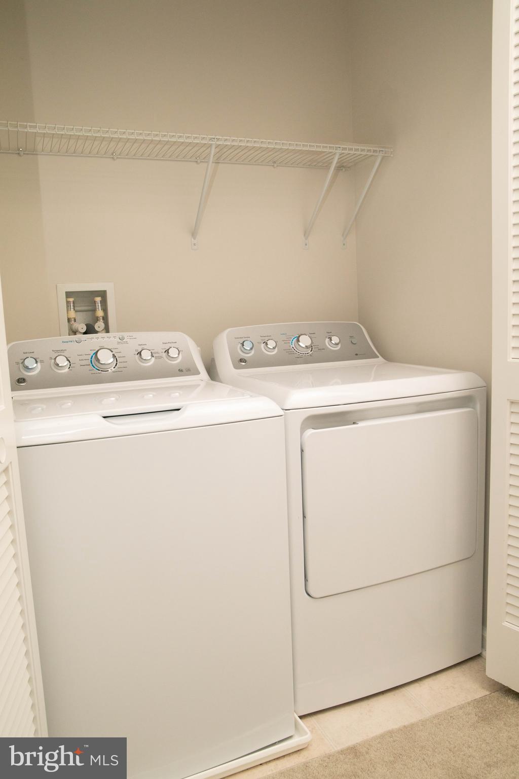 1813 Wind Gate Road Baltimore, MD 21227 - Photo 21 of 27 a utility room with dryer and washer
