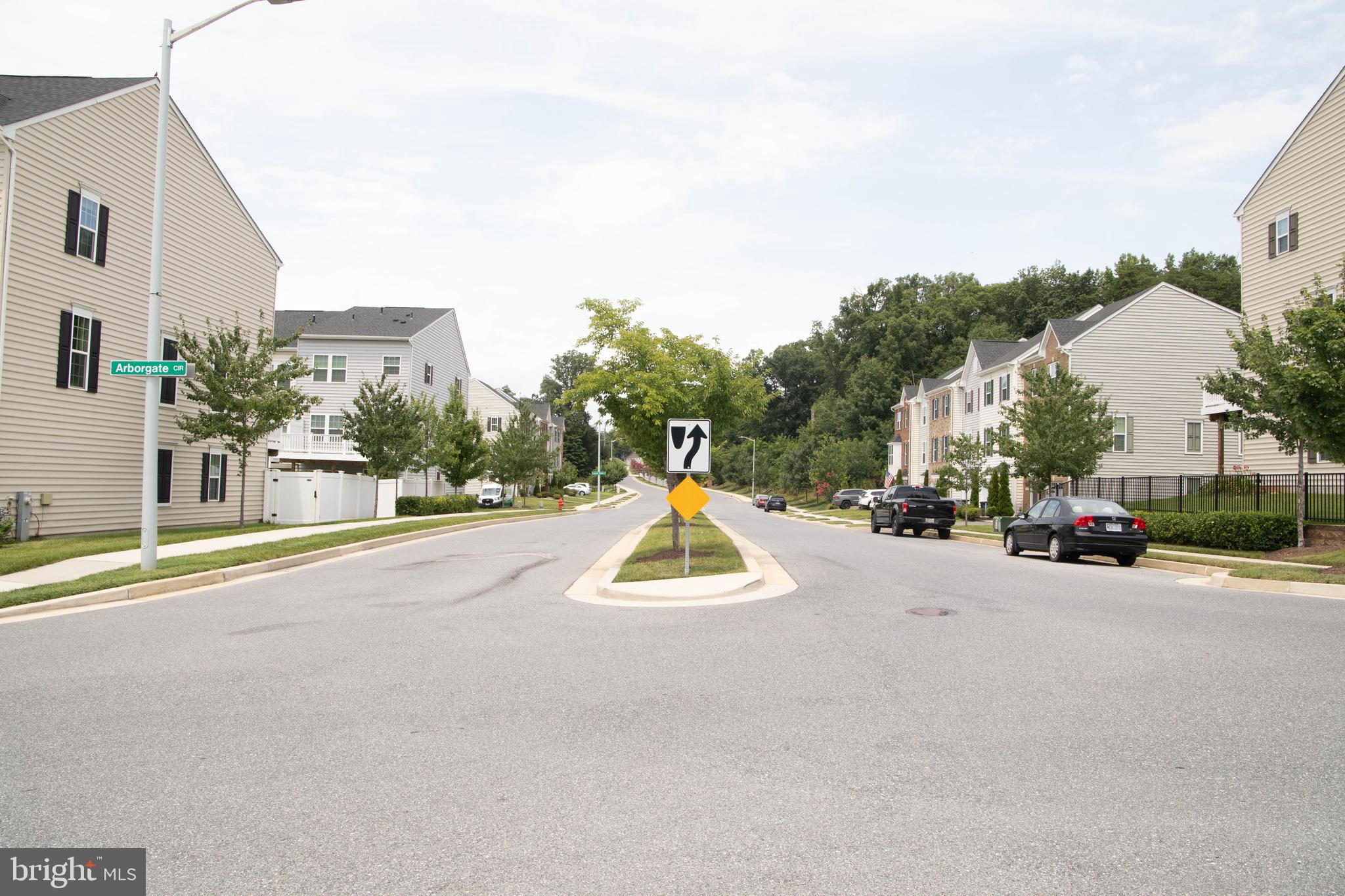 1813 Wind Gate Road Baltimore, MD 21227 - Photo 3 of 27 a view of a street with houses