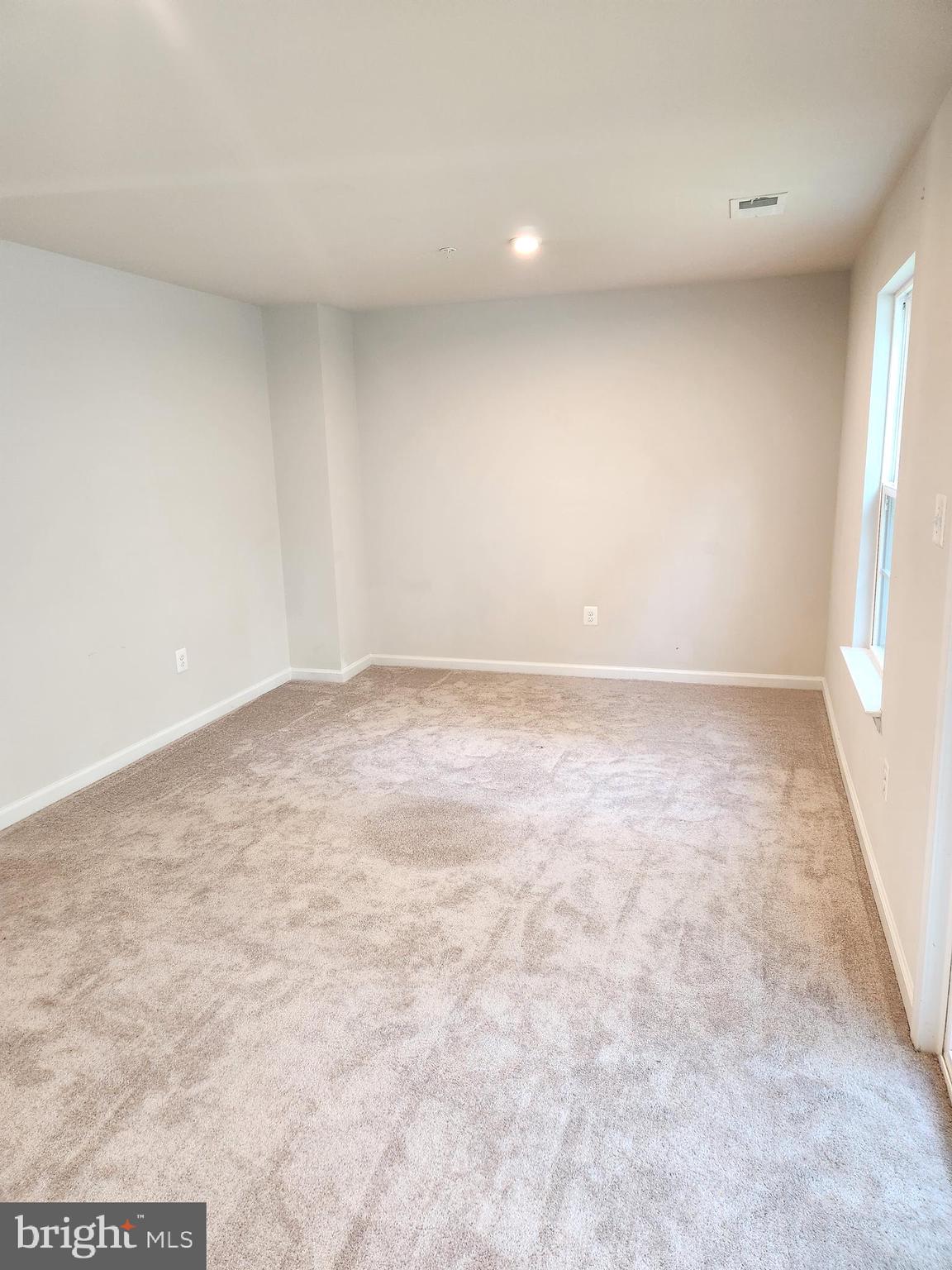 1813 Wind Gate Road Baltimore, MD 21227 - Photo 9 of 27 an empty room with a window